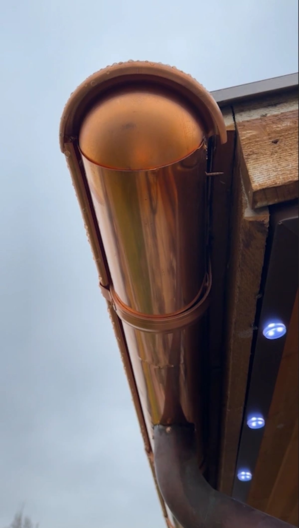 Half-round copper gutters on a unique custom home
